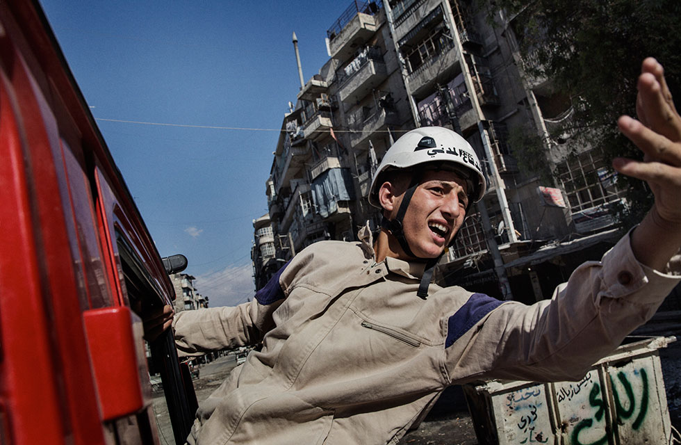Young man in helmet, Syria Civil Defense member